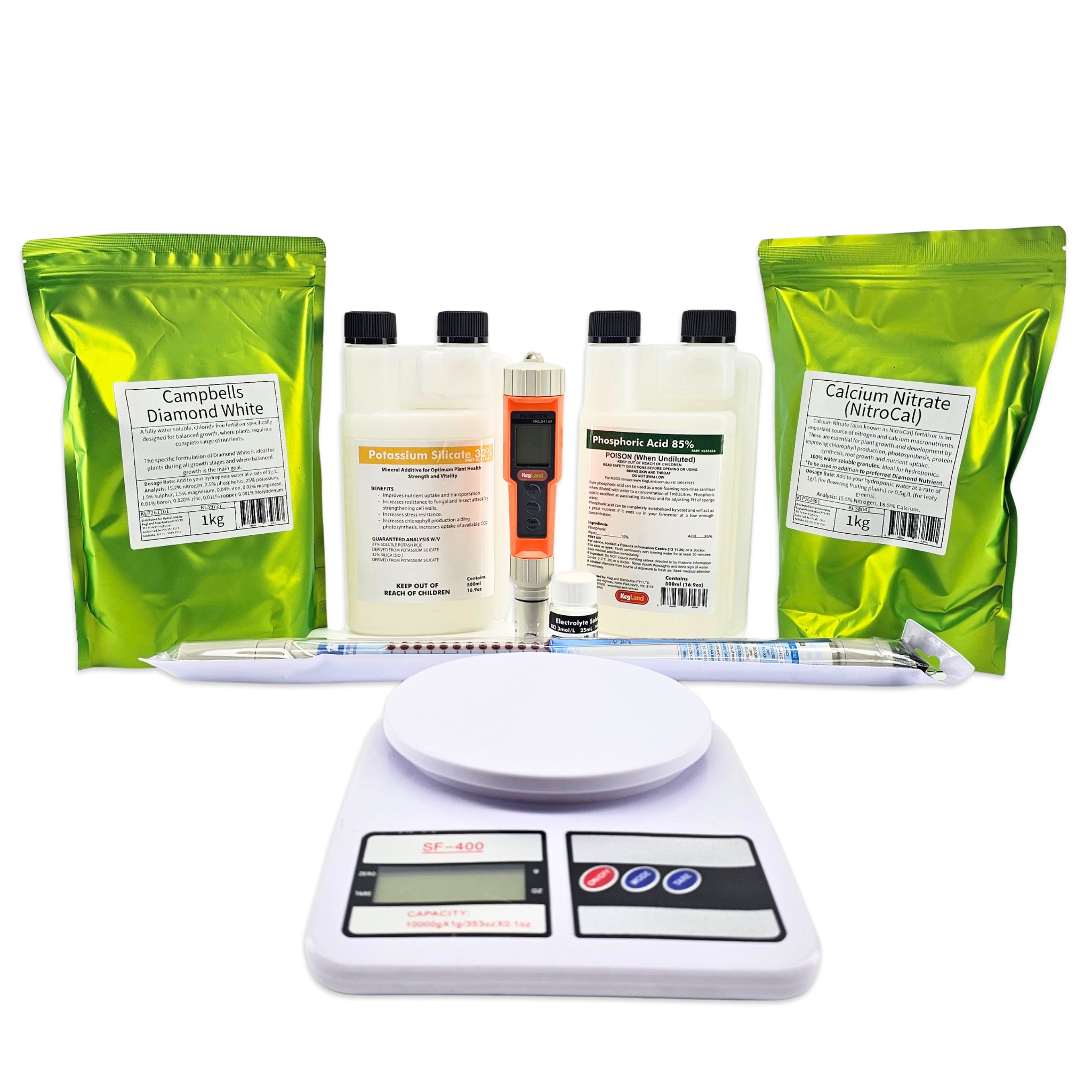 A diamond painting or resin art kit arranged on a white background, including two bright green resealable pouches labeled 'Campbell's Diamond White' and 'Calcium Nitrate (Nitrac) 1kg', three white bottles, a digital scale, a pen, and other small tools.